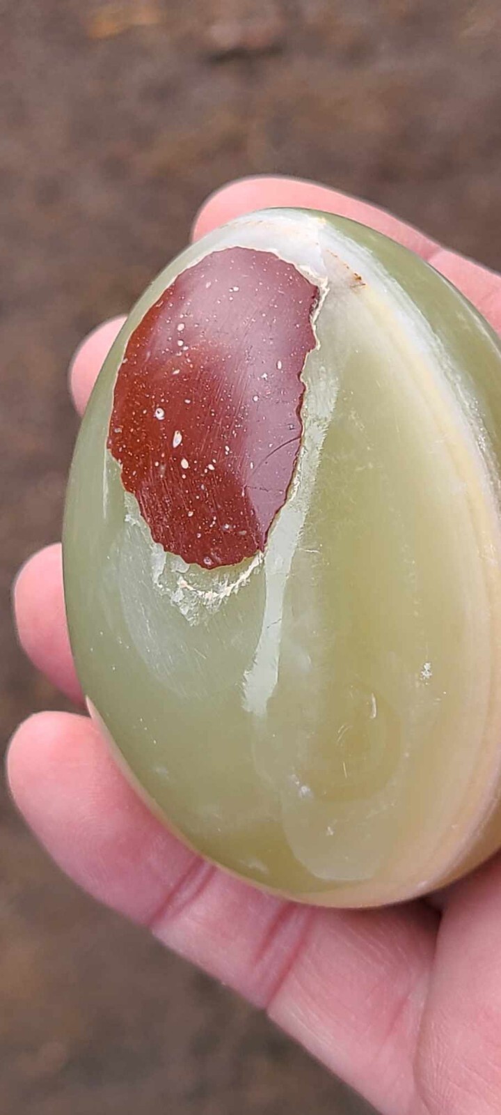 Green Onyx Egg Stone with brown marking. The egg is ~2-3/8″ long and 2″ wide.