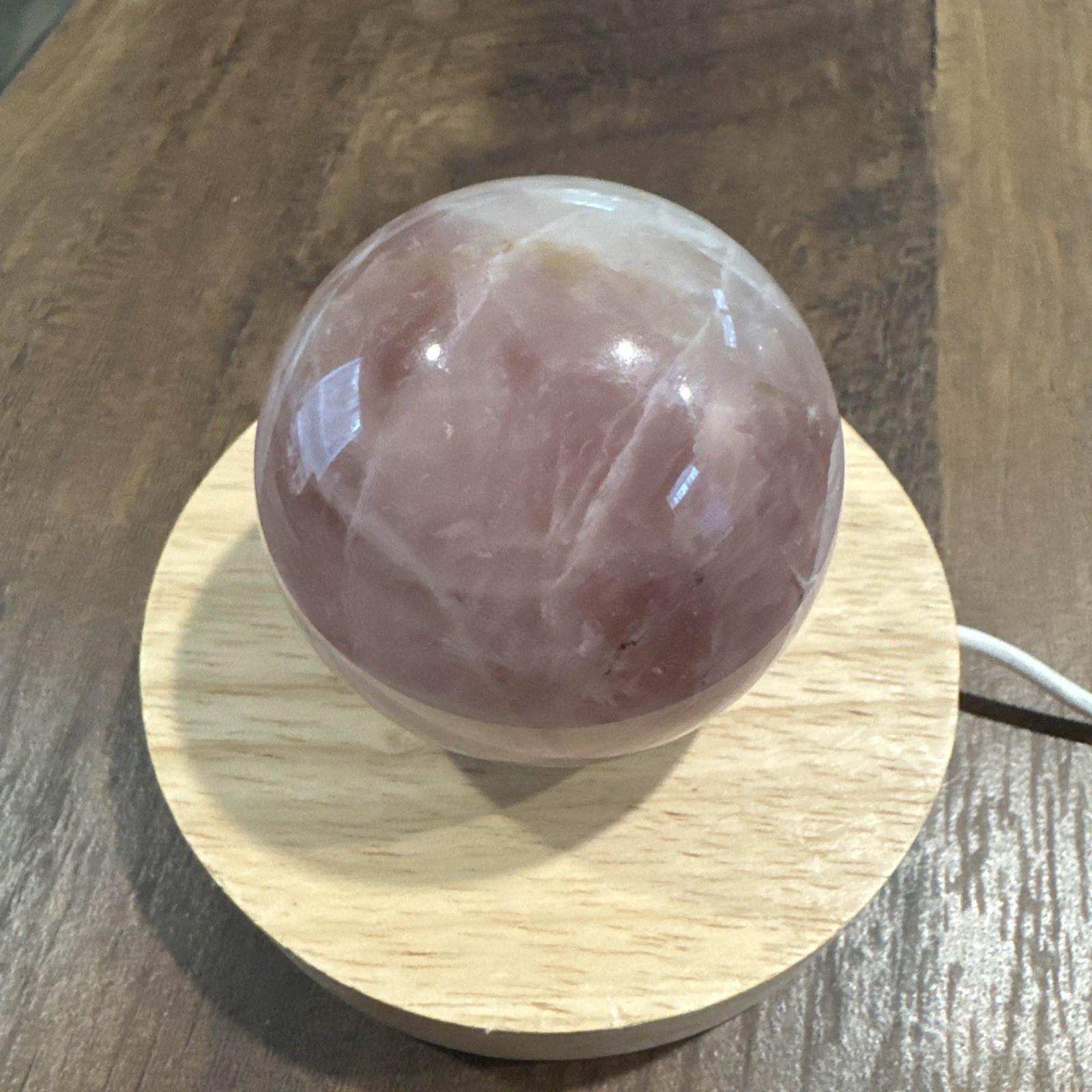Rose Quartz Crystal Sphere On Lighted Stand 289 Grams 59 mm