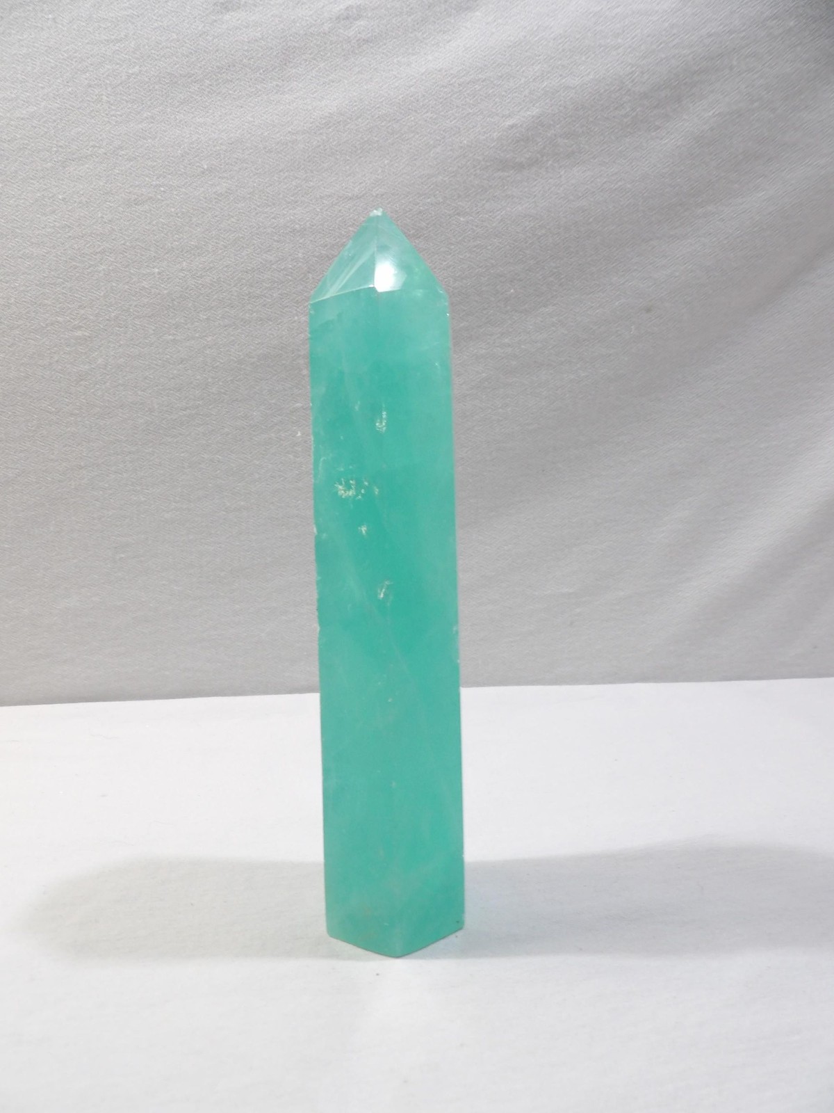 Green fluorite crystal tower, hexagon column obelisk, 6.75L X 1.75W, translucent