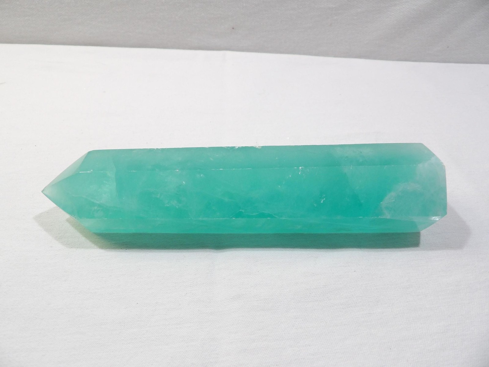 Green fluorite crystal tower, hexagon column obelisk, 6.75L X 1.75W, translucent