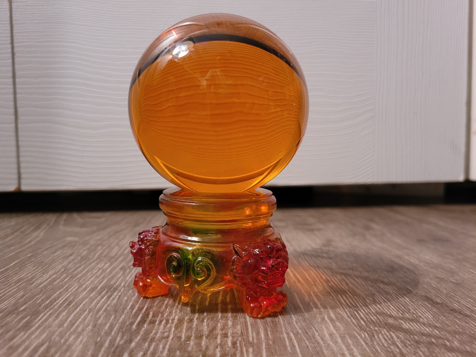 Amlong Crystal Amber 3 in. (80mm) Crystal Ball with Rainbow Lion Stand