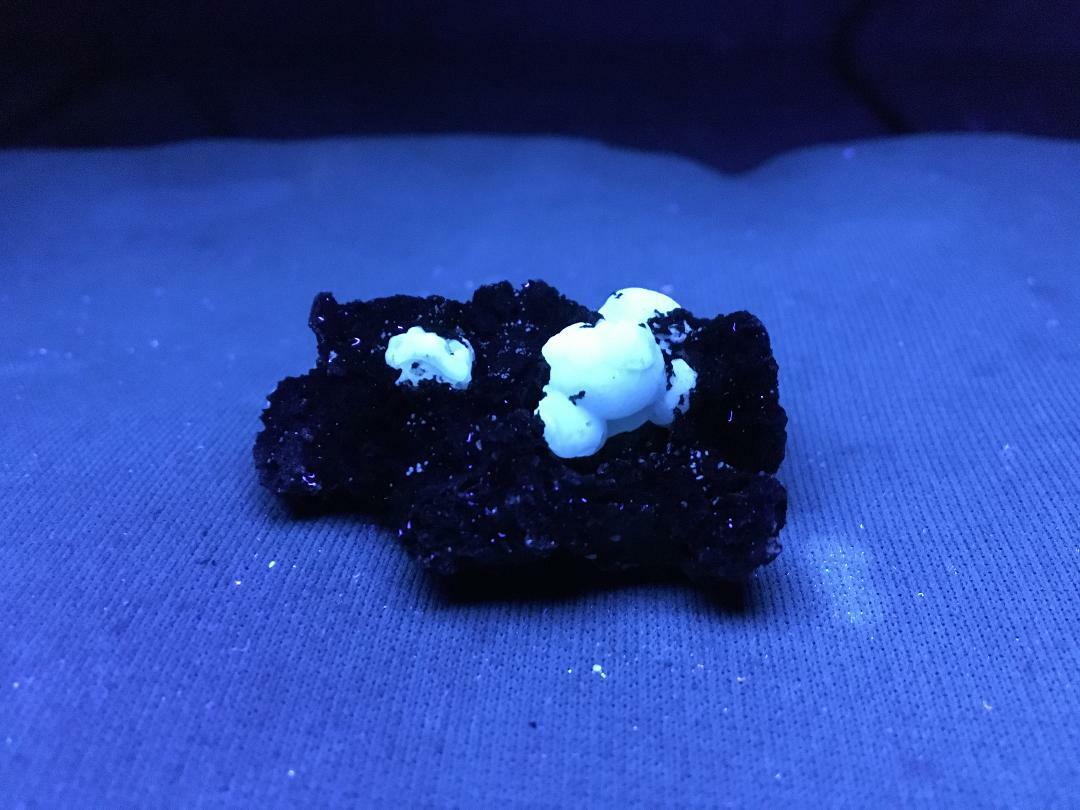 KB: FANTASTIC! BRIGHT FL. & PHOS. BLUE/WHITE SW CALCITE IN LAVA ROCK, GERMANY