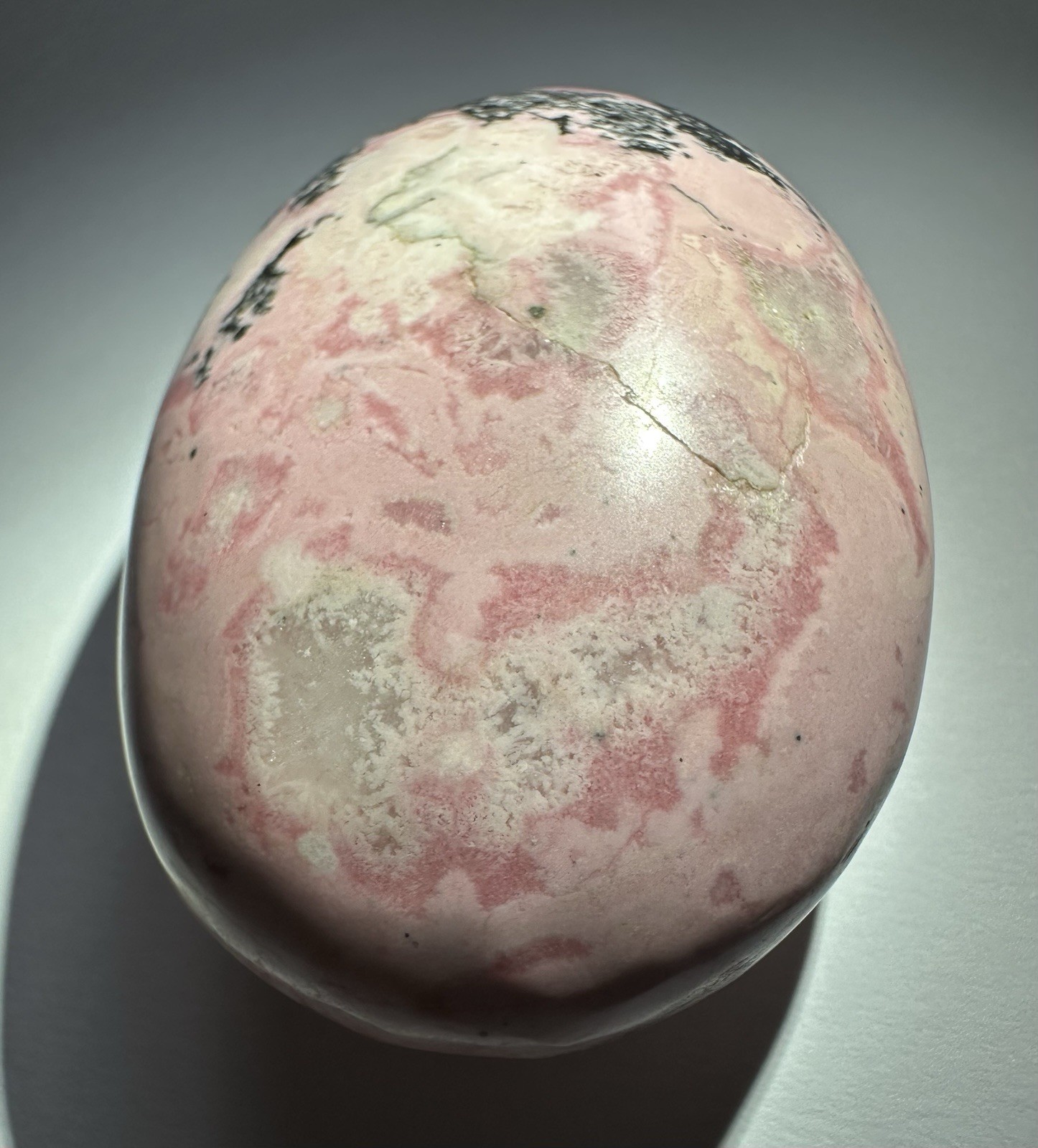 Polished Pink Rhodonite Palm Stone, Oval Egg Shape Mineral Specimen, 3 in