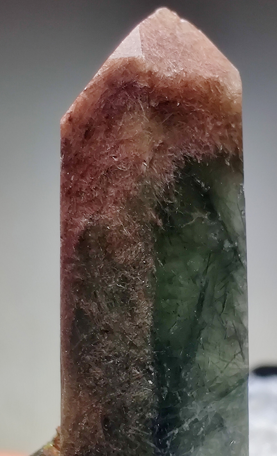 Epidote included Quartz crystal. Balochistan, Pakistan. 3 cm.