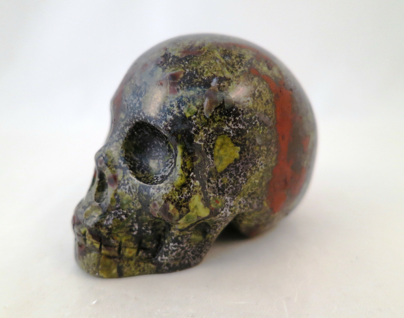2.1″ DRAGON BLOODSTONE Carved and Polished SKULL