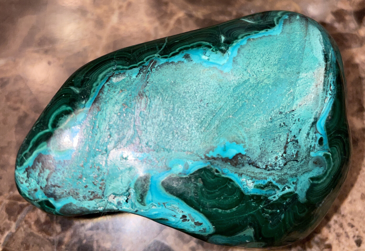6.1oz Dark Green Malachites. Length 2 3/8”, Width 1 3/4”, Height 1 3/8”