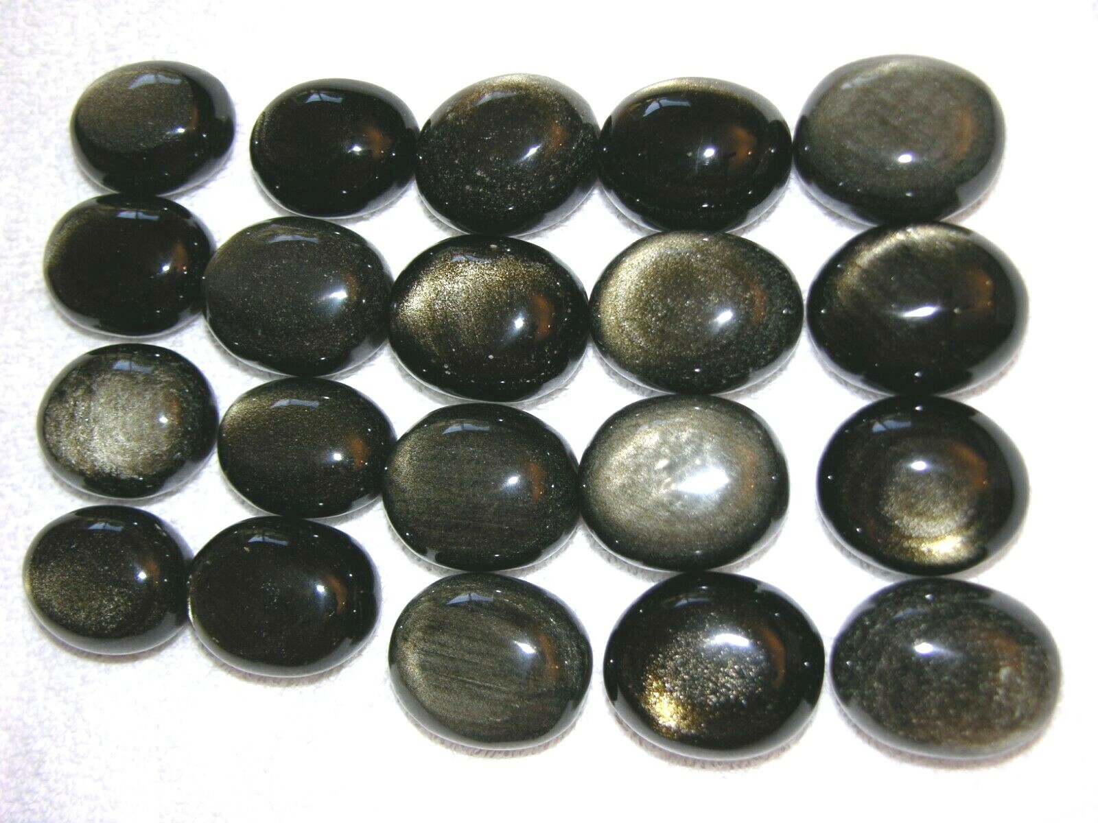 Golden silver sheen obsidian palm stone gem grade 1.5×1 inch 1 stone per winner