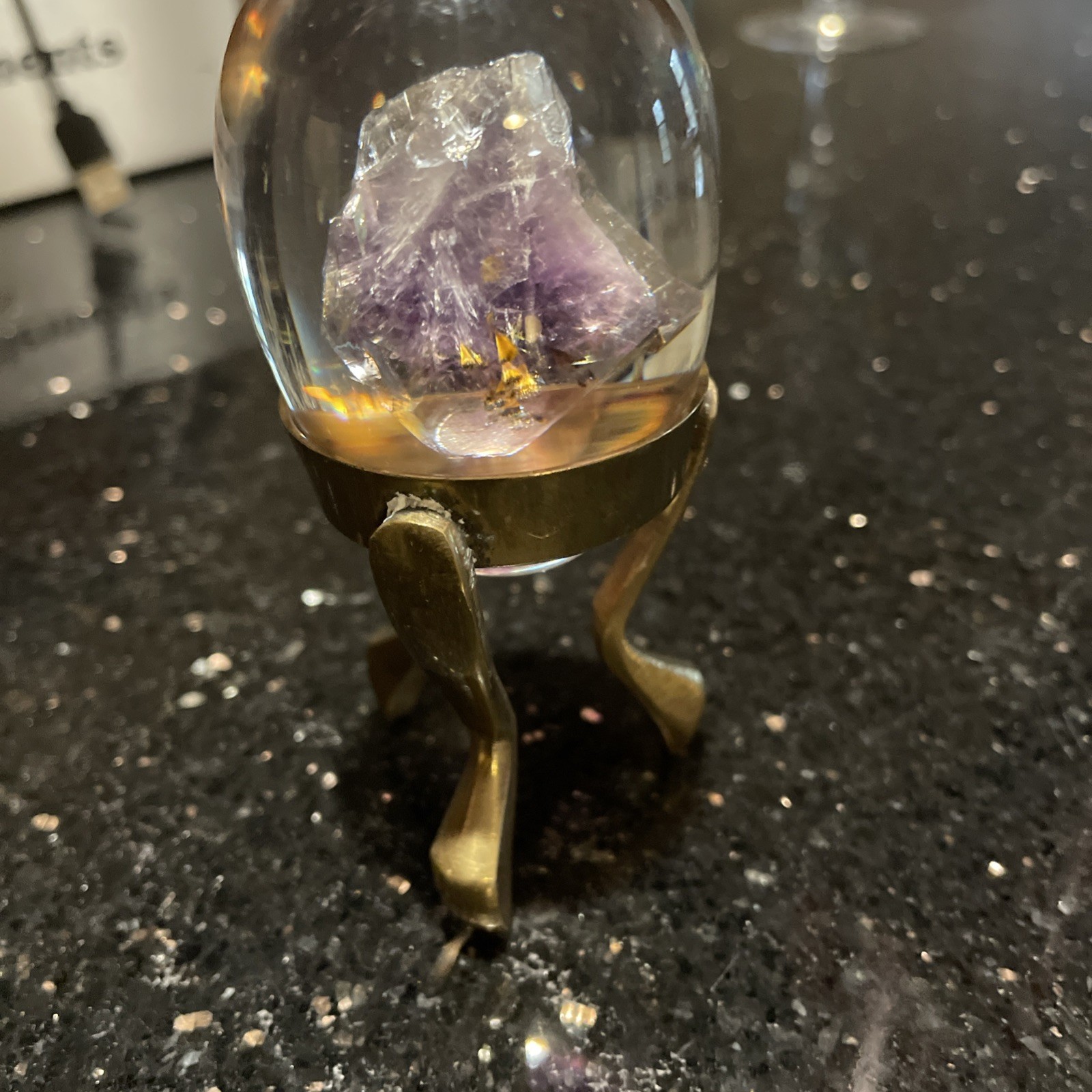 Amethyst Egg Encased In Lucite With Linear Inclusions With Brass Stand