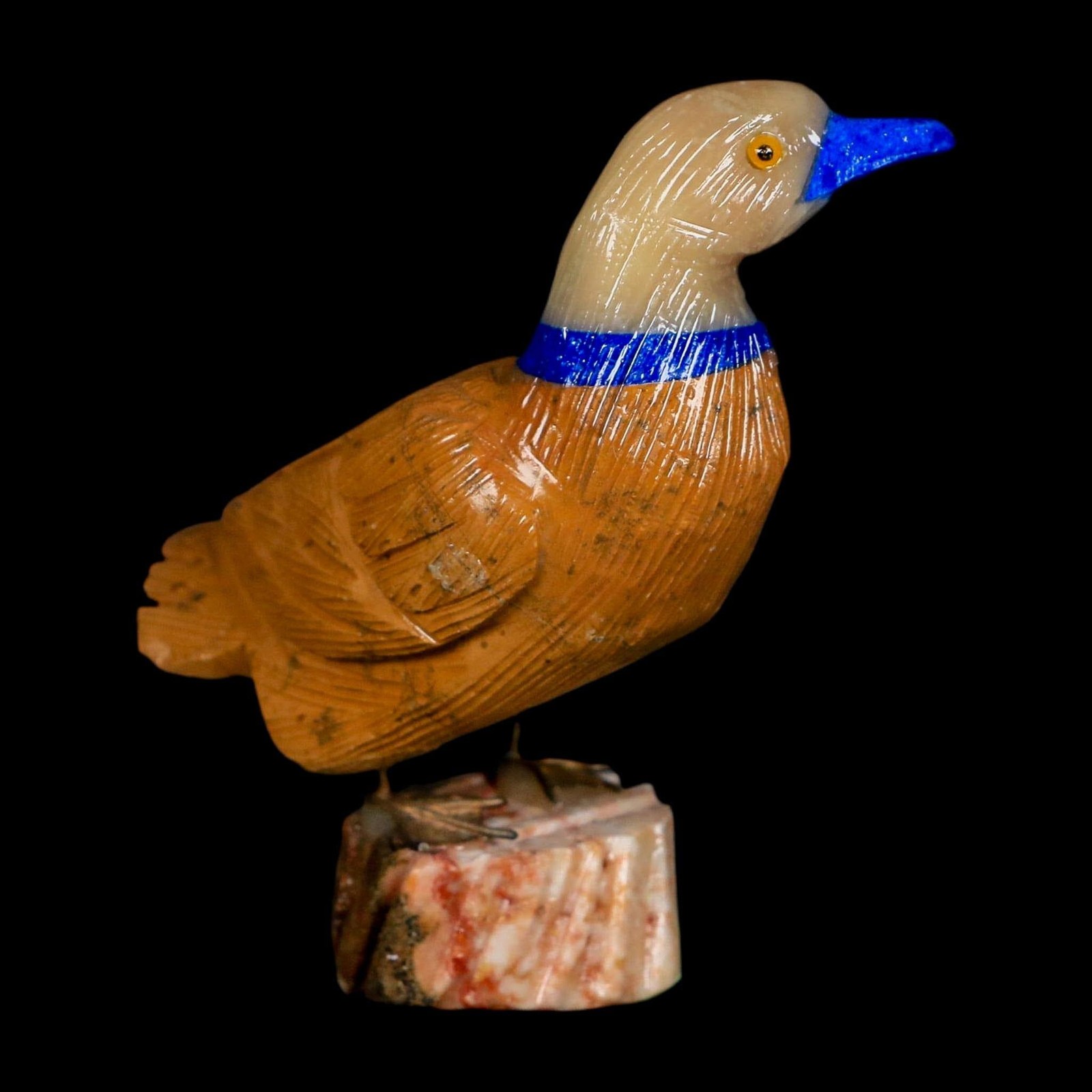 3.5″ Hand Carved Duck Perched on Red White Calcite, Brown Calcite, And Sodalite