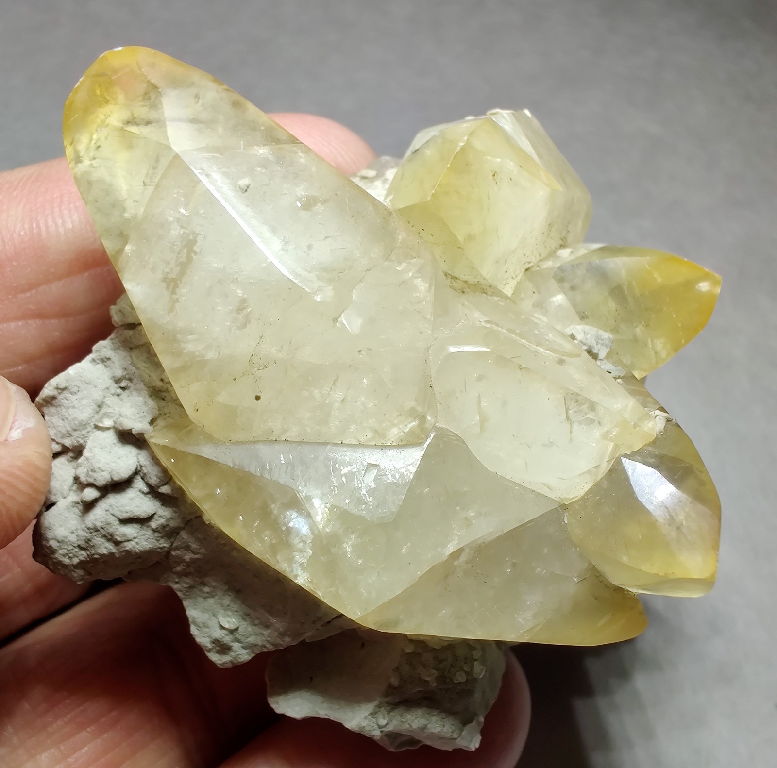 Calcite crystals on Limestone matrix, fluorescent. Indiana. 101 grams.