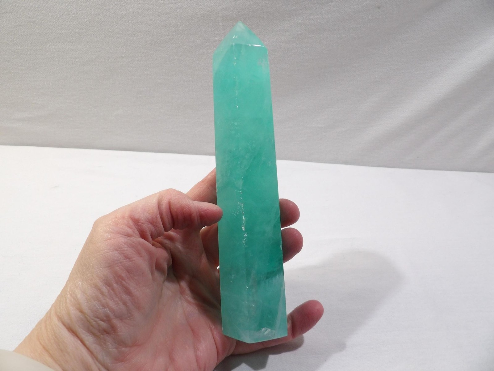 Green fluorite crystal tower, hexagon column obelisk, 6.75L X 1.75W, translucent