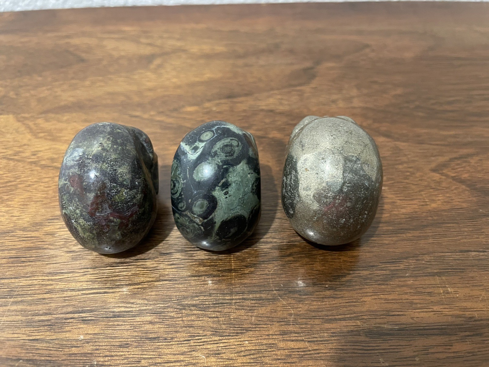 Lot Of (3) Crystal Skulls-Dragon Blood, Pyrite & Kambamba Jasper 2 Inch