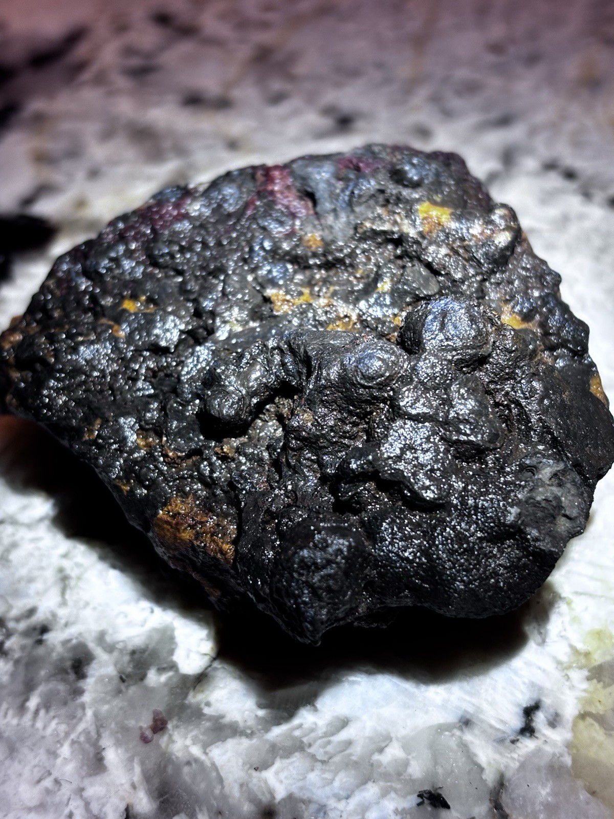 this rock looks like it came from hell! iron ore or silver ore ? meteorite?