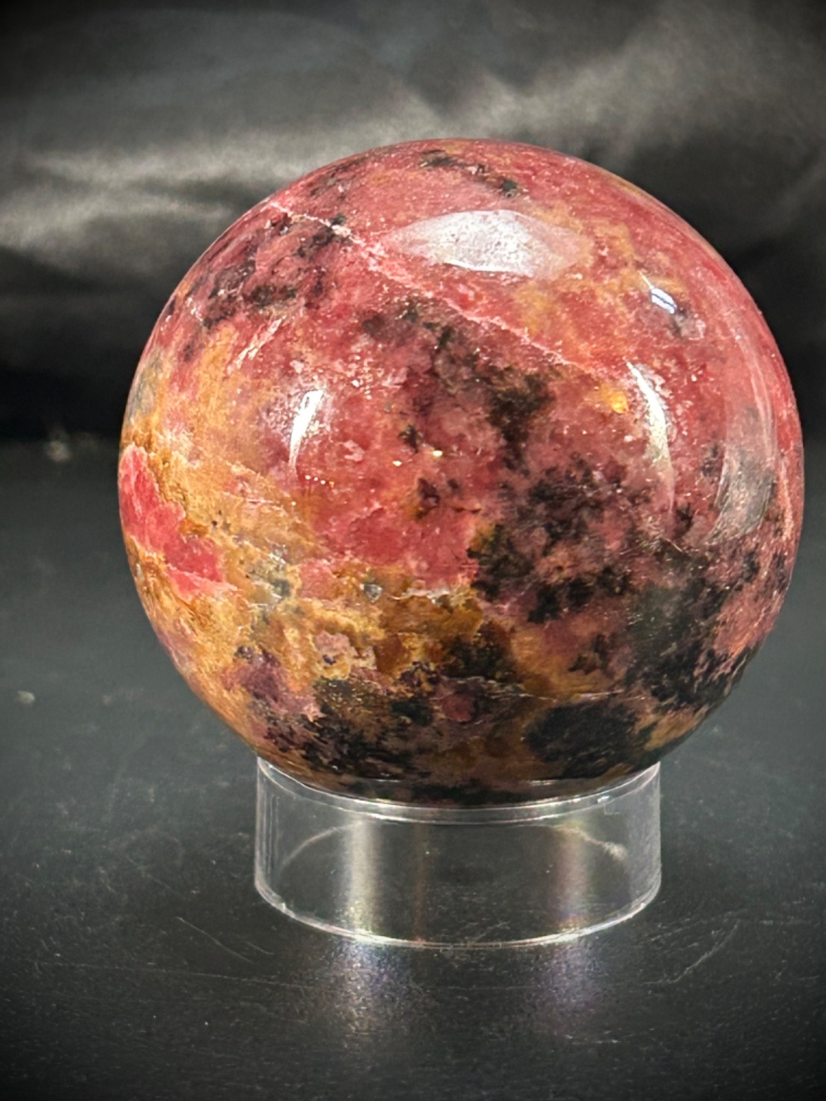 2.06″ Rhodonite Sphere With Acrylic Stand 9.9oz (281 grams)