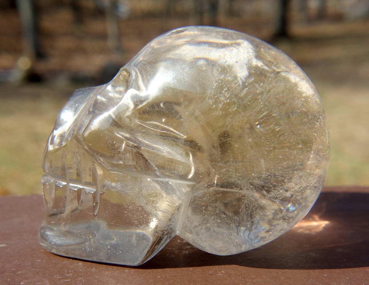 Quartz Crystal Skull Carving with Rainbows and a Touch of Smoky