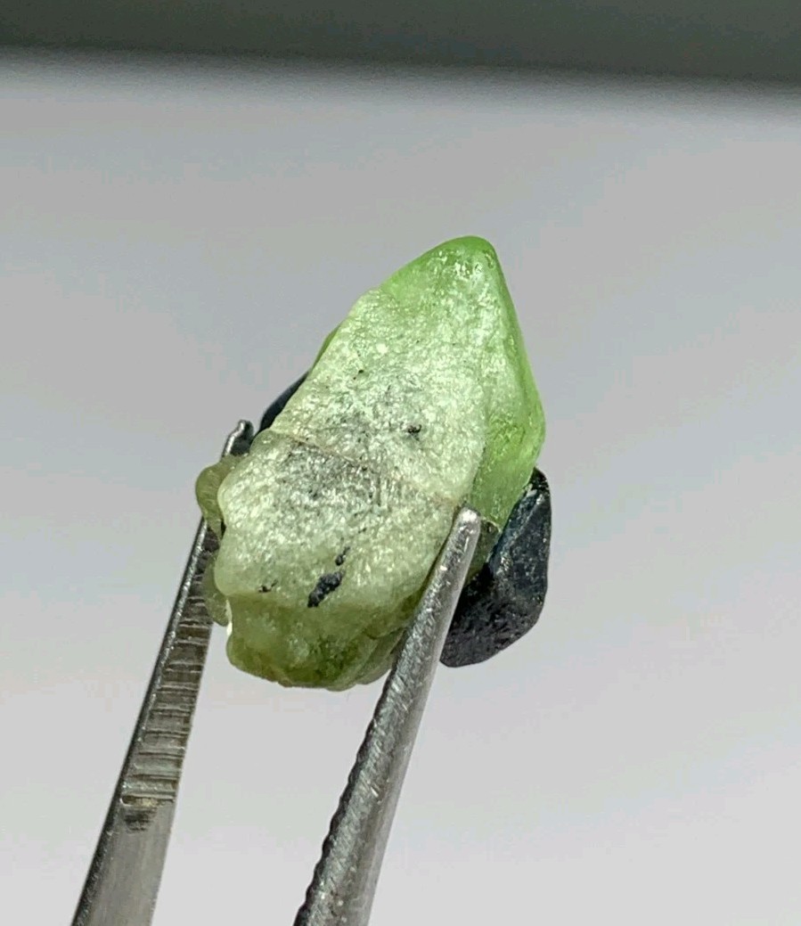3.5 gm Small Size Stunning Peridot Crystal Combine With Magnetite Crystal.