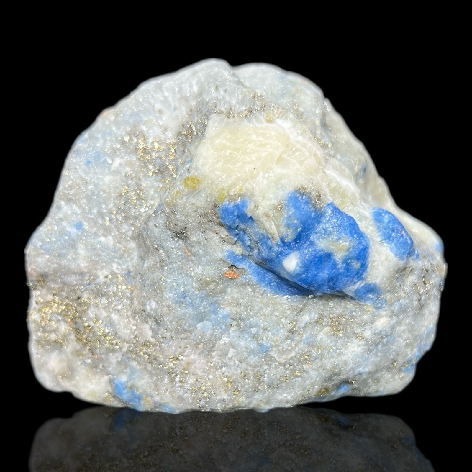 Afghanite, Lazurite, Marialite, Scapolite, Calcite, Fluorapatite, Phlogopite,
